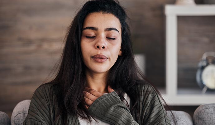 A person is facing breathing issue due to biohazard threat