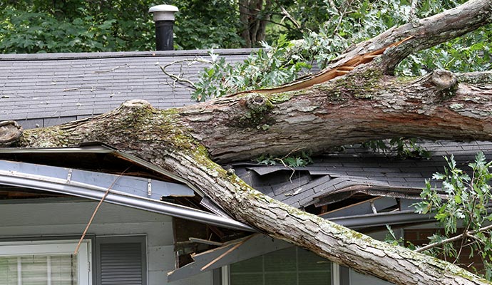Damaged roof due to storm Damaged roof due to storm