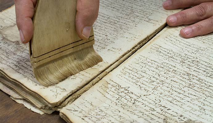 Document restoration cleaning ancient manuscript