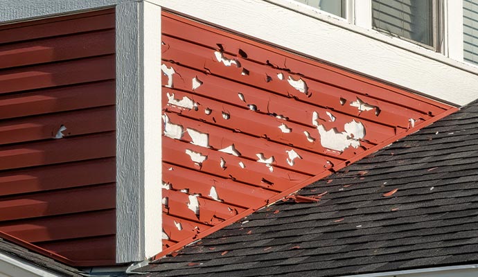 Hail damaged house wall