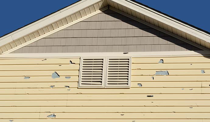 Hail damaged house