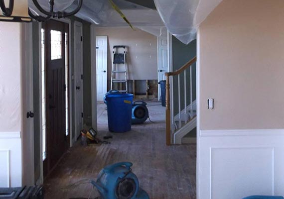 Water damaged house exttraction on going