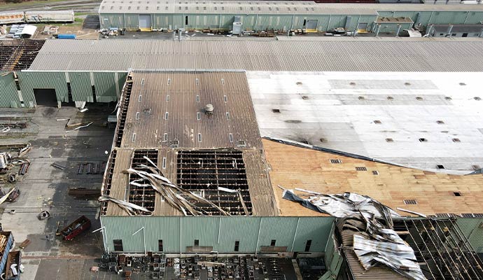Storm damaged roof of a commercial property