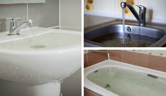 Water overflowing from bathroom and kitchen sink and shower tub