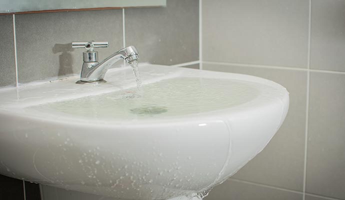 Water overflowing from bathroom floor