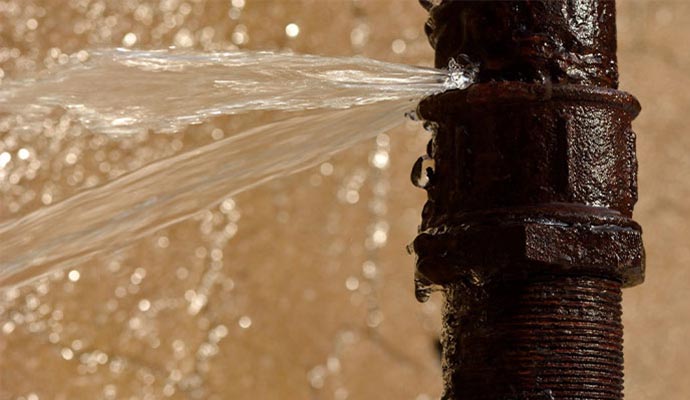 Water spraying from a broken water pipe